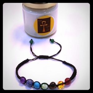 Ankh 4oz  Soy Candle with a Chakra Bracelet.